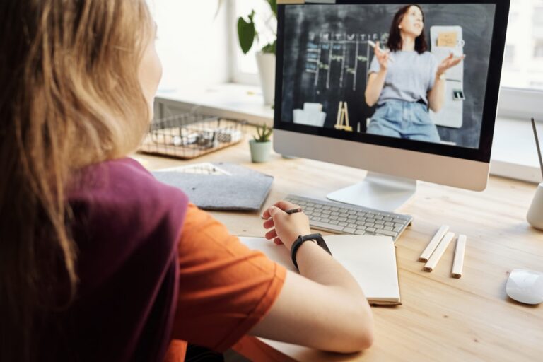 photo-of-girl-watching-through-imac-4144222