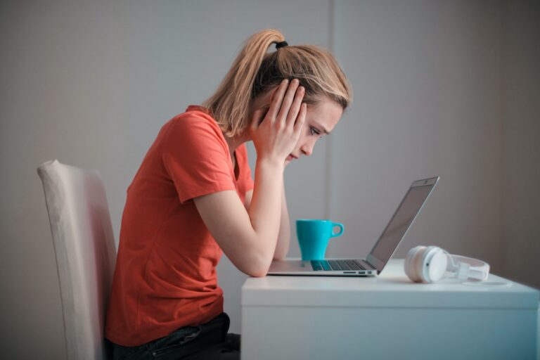 young-troubled-woman-using-laptop-at-home-3755755-scaled (4)
