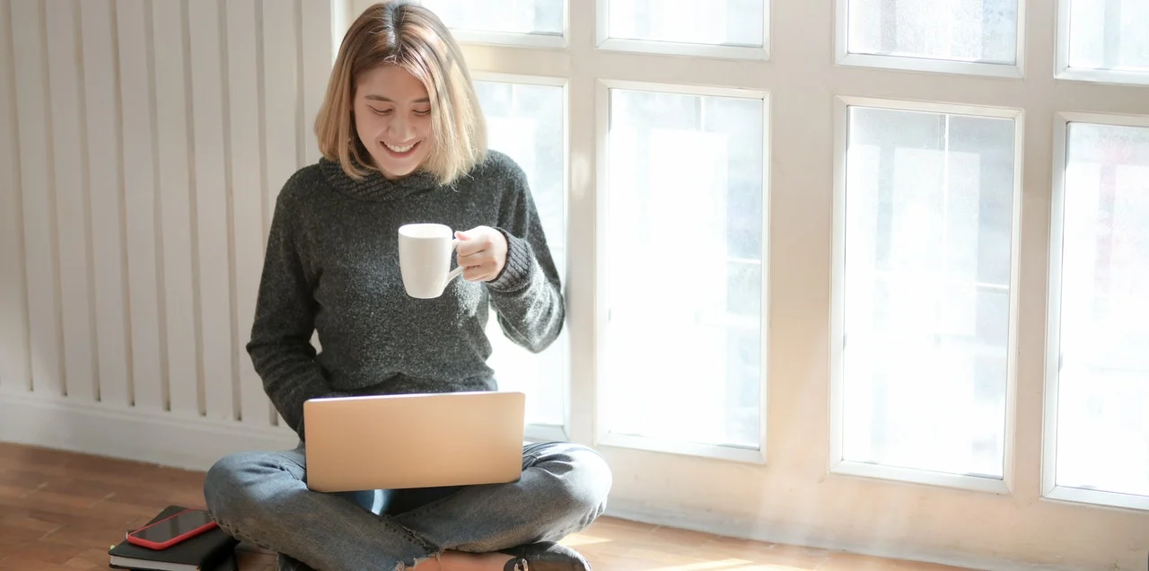woman-in-gray-sweater-drinking-coffee-3759089 (1)